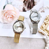 Guess Whisper Silver Dial Gold Mesh Bracelet Watch for Women - W1084L2