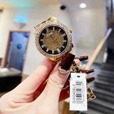 Guess Night Life Diamonds Black Dial Gold Steel Strap Watch for Women - GW0405L2
