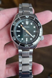 Seiko Prospex 140th Anniversary Limited Edition Automatic Scuba Divers Green Dial Silver Steel Strap Watch for Men - SPB207J1