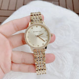 Michael Kors Melissa Quartz Gold Dial Gold Steel Strap Watch for Women - MK4368